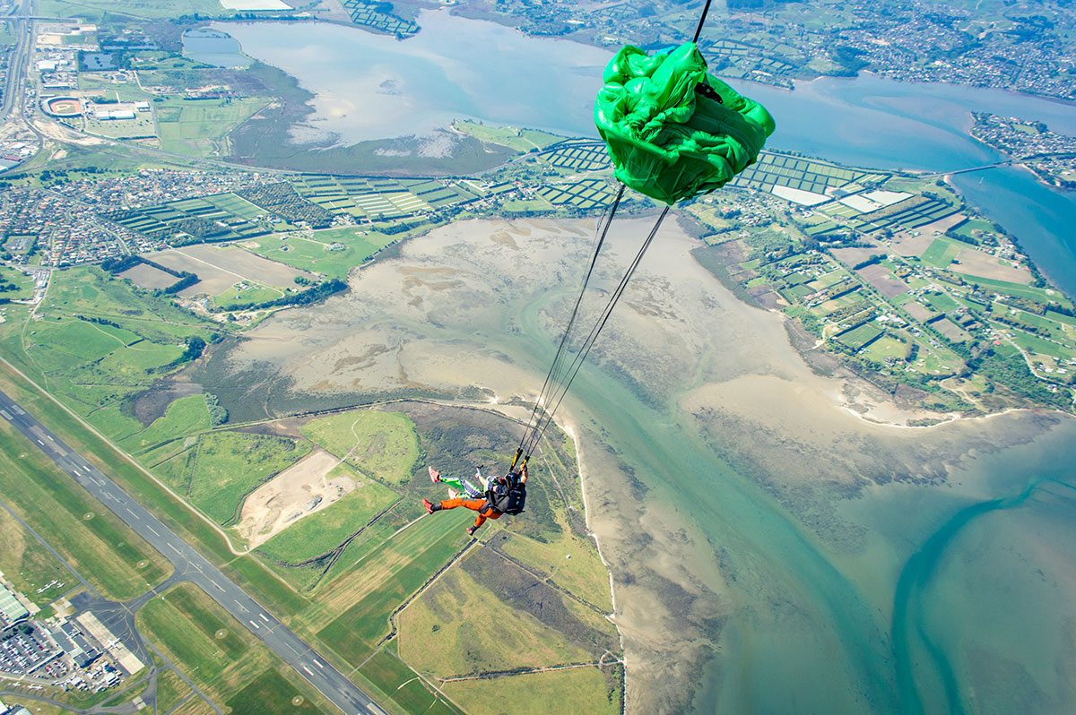 Skydiving above New Zealand when the parachute opens